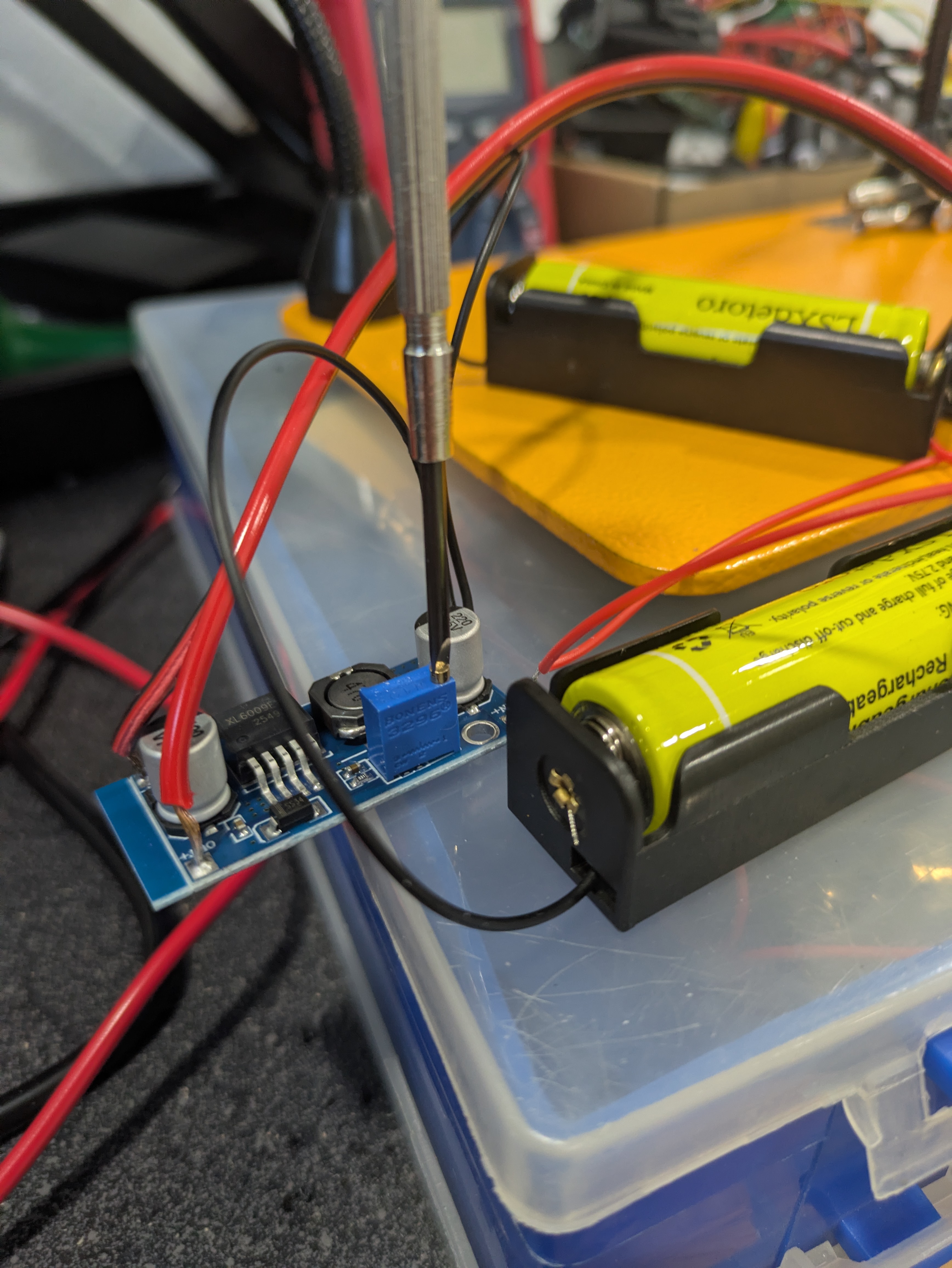 XL6009 boost converter and 18650 batteries in their holders
