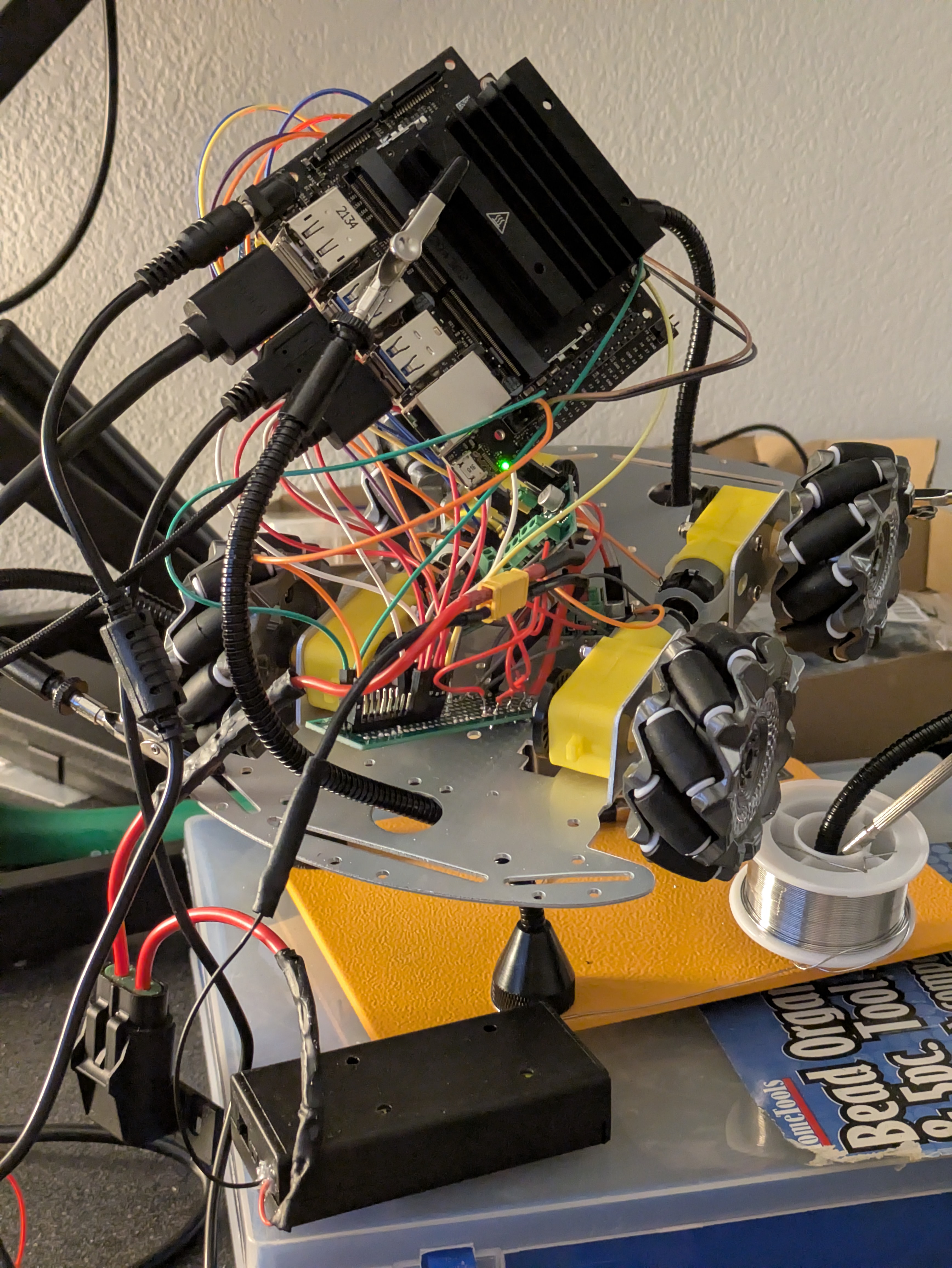 The rover assembled with the Jetson Nano mounted and all four drivers wired